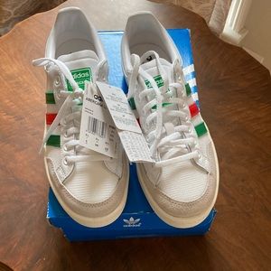 NWT green and red on white sneaker.